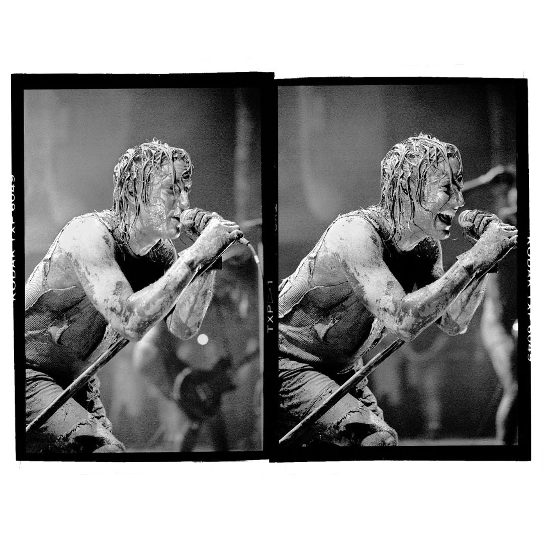 Singer Trent Reznor of the Industrial rock act Nine Inch Nails is shown  performing on stage at Woodstock '94 Stock Photo - Alamy