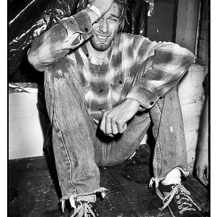 Kurt Cobain of Nirvana crying backstage after a Sub Pop showcase, Seattle 1990, photographed by Ian Tilton